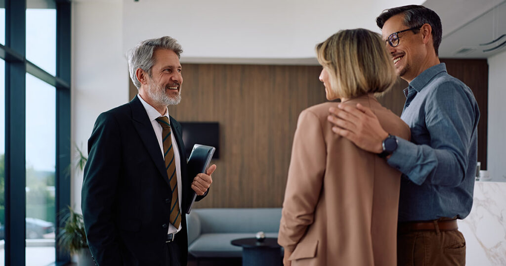 Family meeting with a financial advisor to discuss starting a family office, outsourced advisory services and multigenerational wealth planning.
