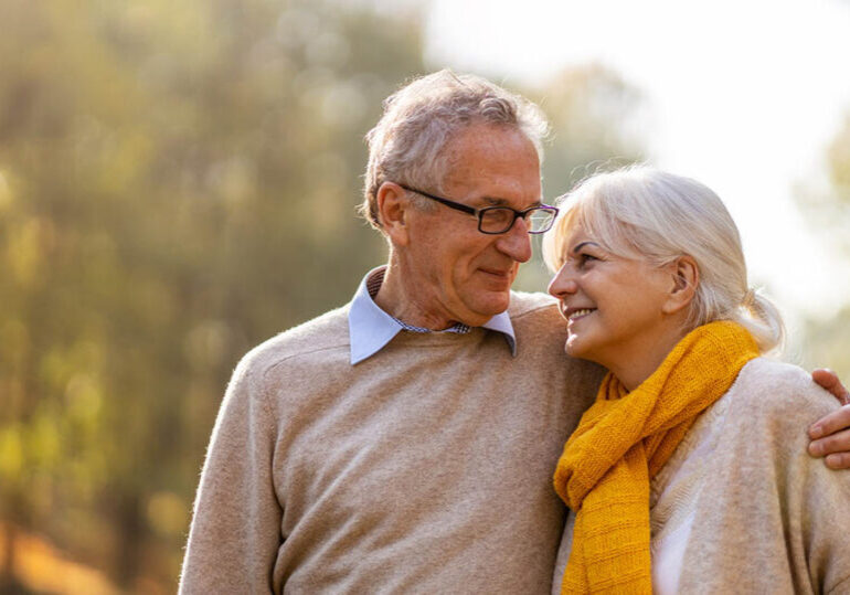 Happy senior couple discusses their plans for income in retirement