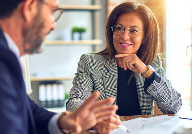 Business owner evaluating her outsourced provider in a meeting