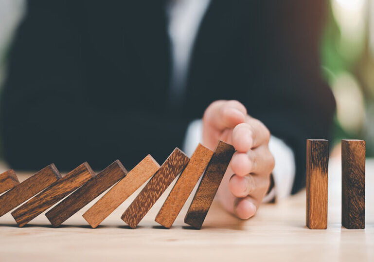 Business leader illustrating how a risk management strategy can protect a business